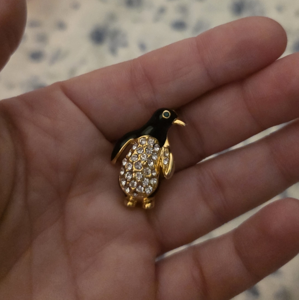 Elegant Penguin Brooch with Gold Toned and Black Enamel Green And White Gems
